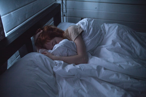 Why a Regular Sleep Schedule Matters (And How to Get Into One)